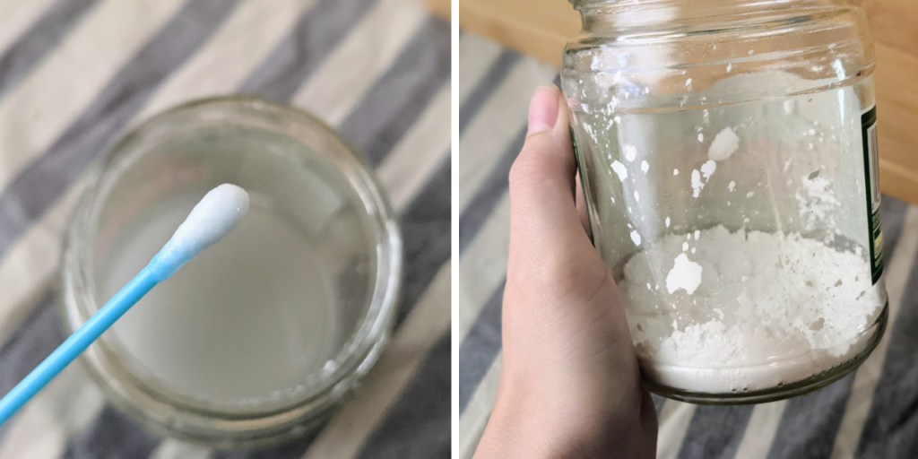 Hand holding jar of powdered sugar mixture and q-tip 