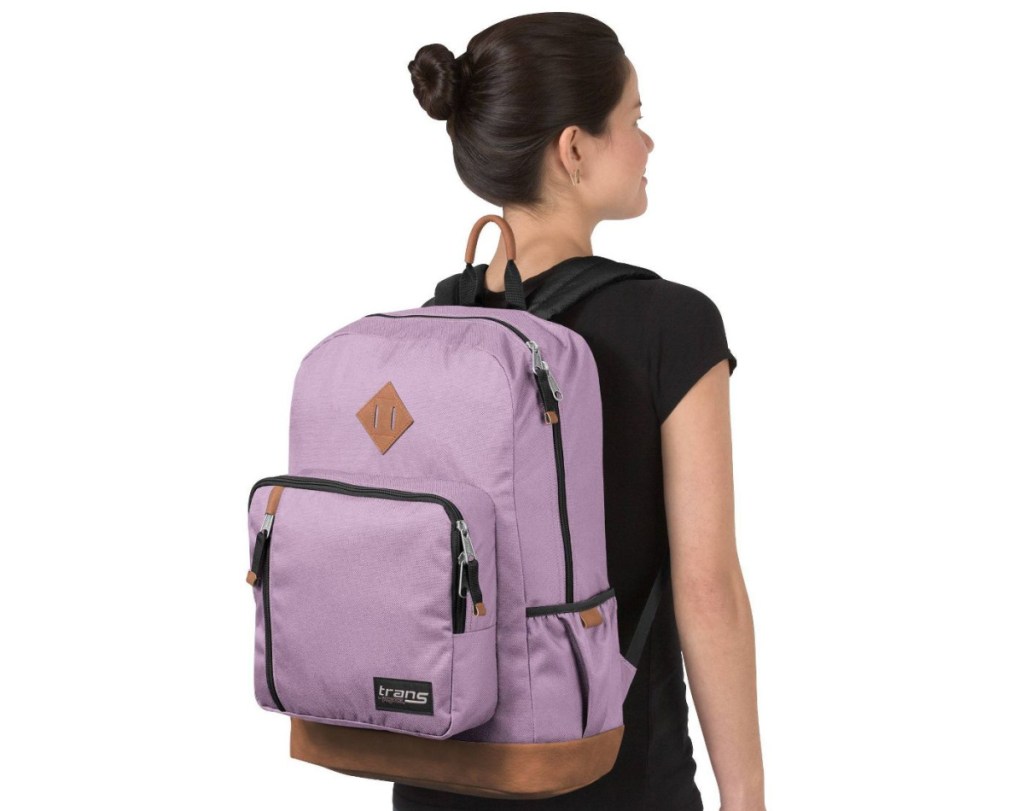 woman wearing pink backpack