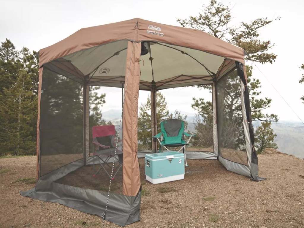 brown screened tent set up for camping