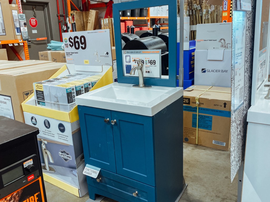 Bathroom Vanity and Faucet on display at home depot