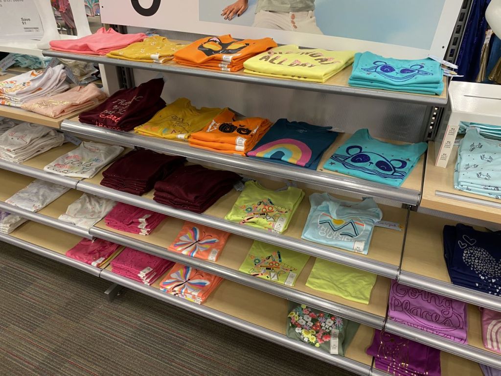 display of girls shirts at Target