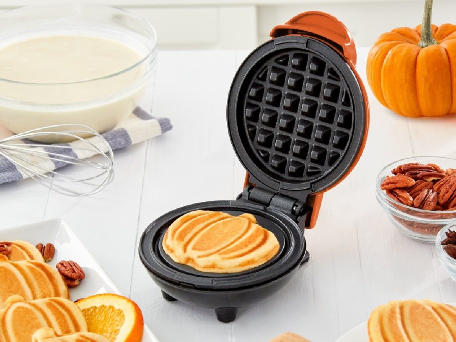 Dash Pumpkin Waffle Maker on kitchen counter