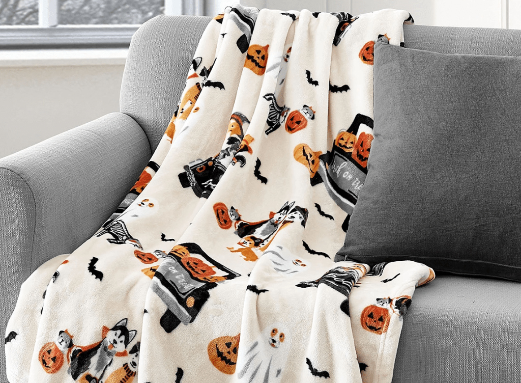 Halloween throw blanket on a couch