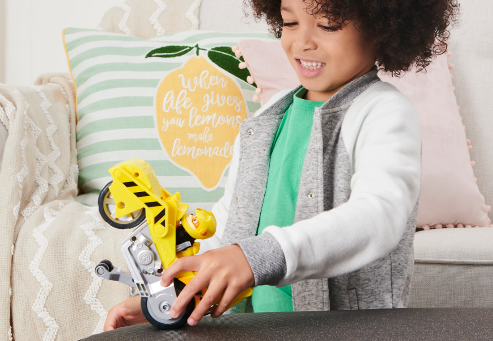 kid playing with a Paw Patrol Rubble Toy