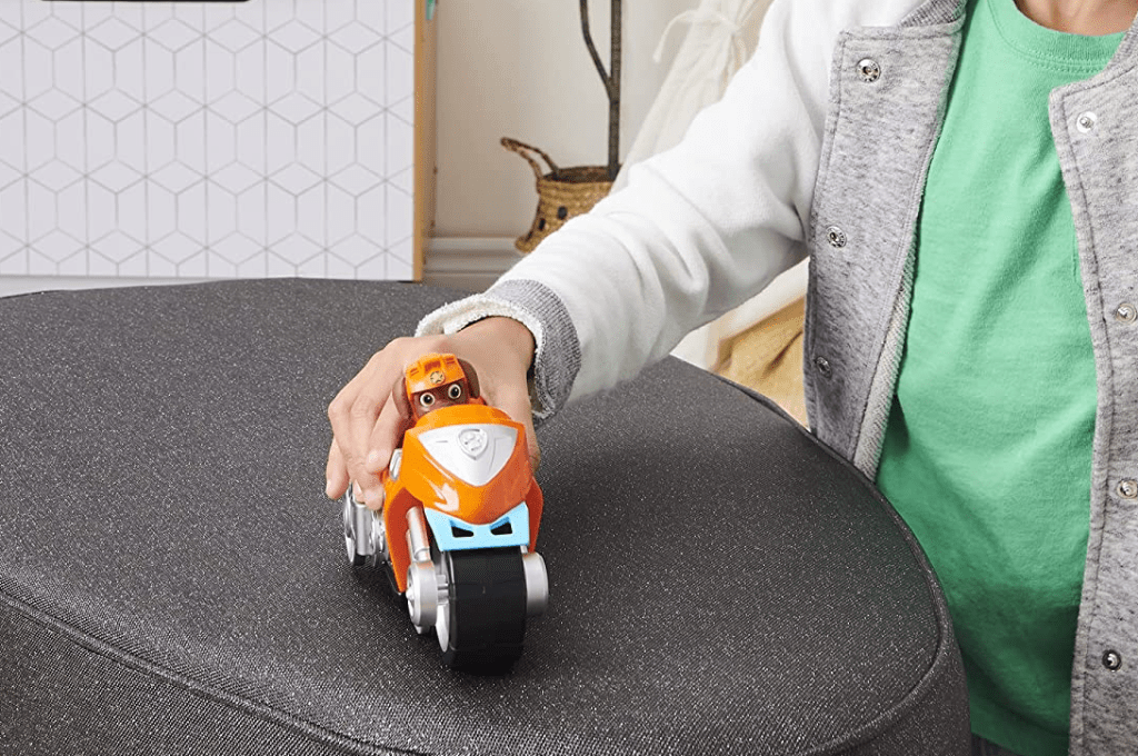 boy playing with Paw Patrol Zuma's Motorcycle