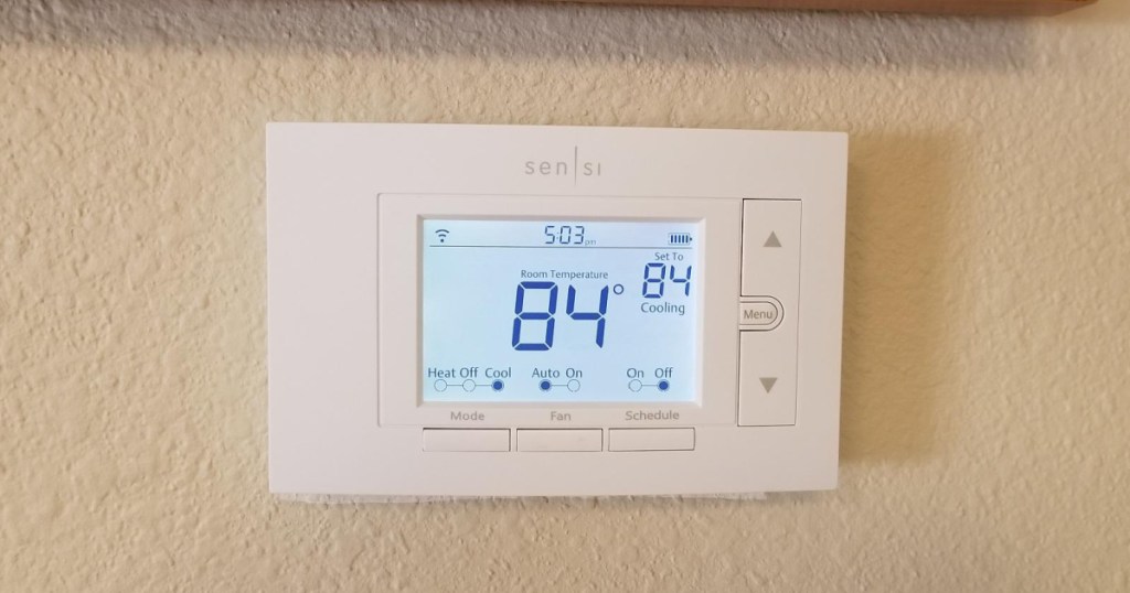 sensi smart thermostat on a wall 