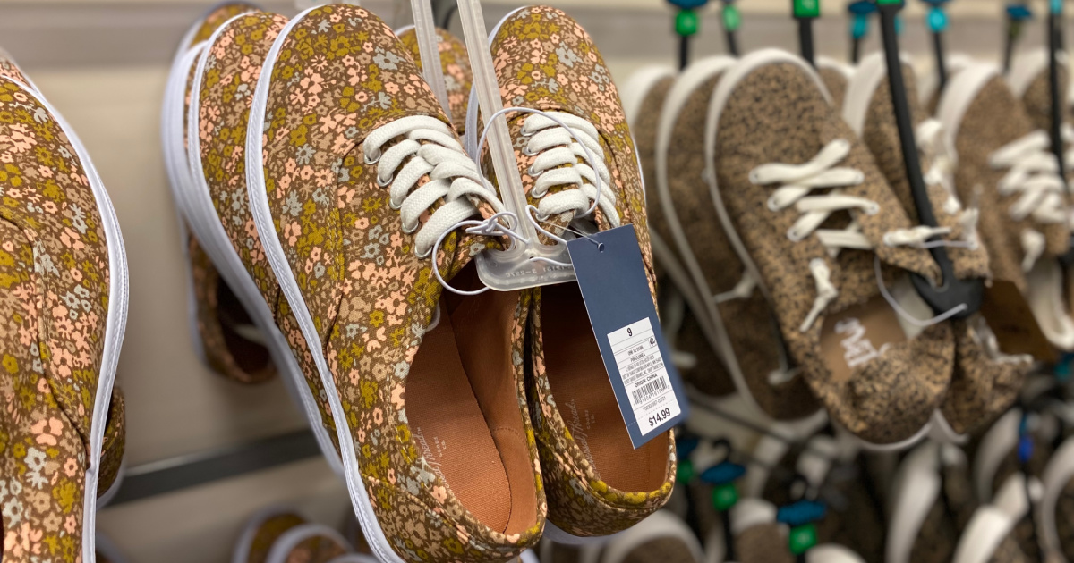 women's floral sneakers on display