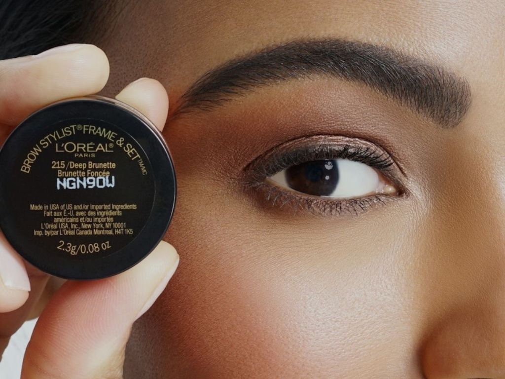woman holding up brow stylist frame set