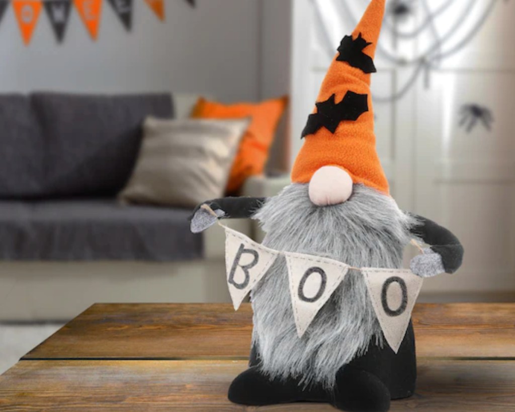 halloween gnome holding boo sign