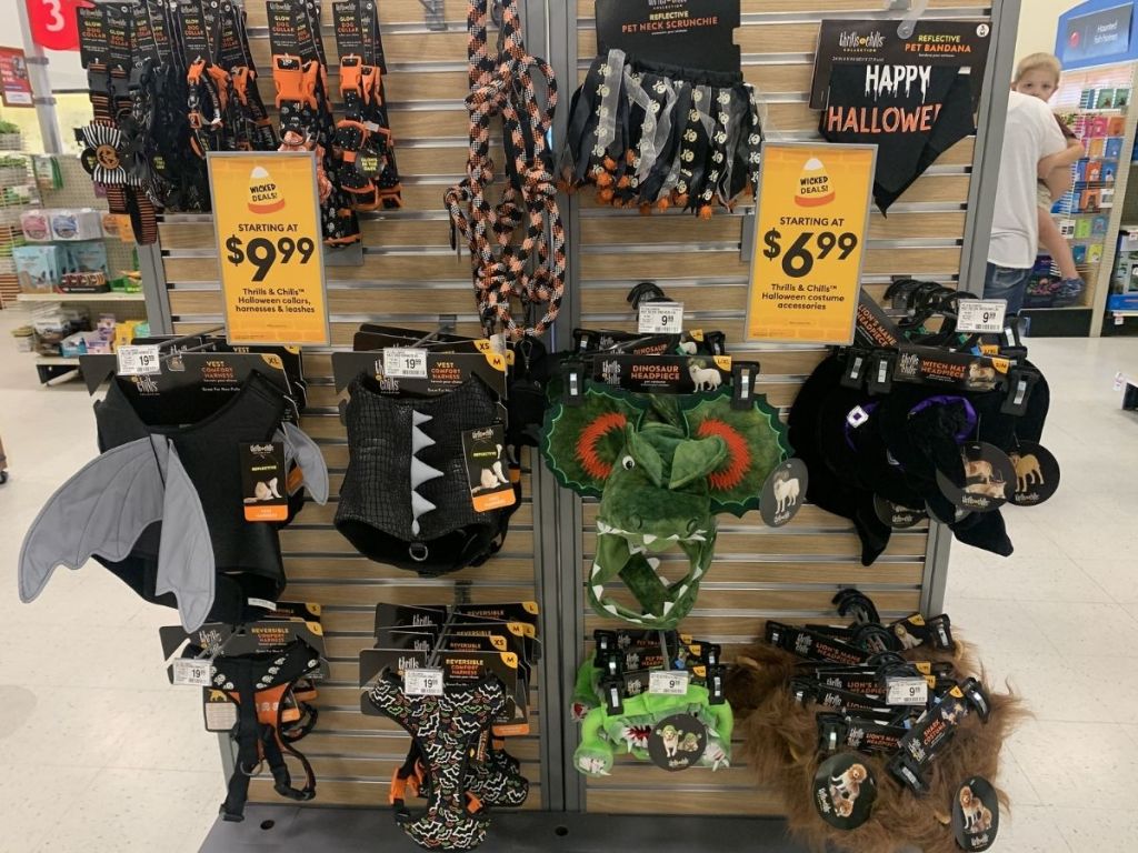 Halloween pet accessories hanging in store