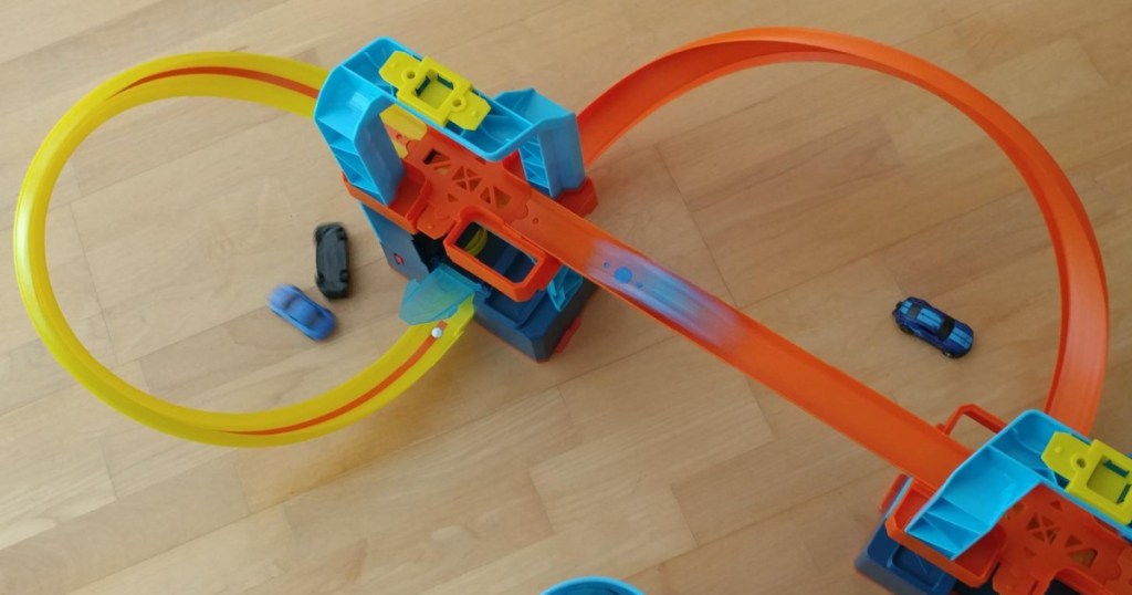 hot wheels track playset on wood floors