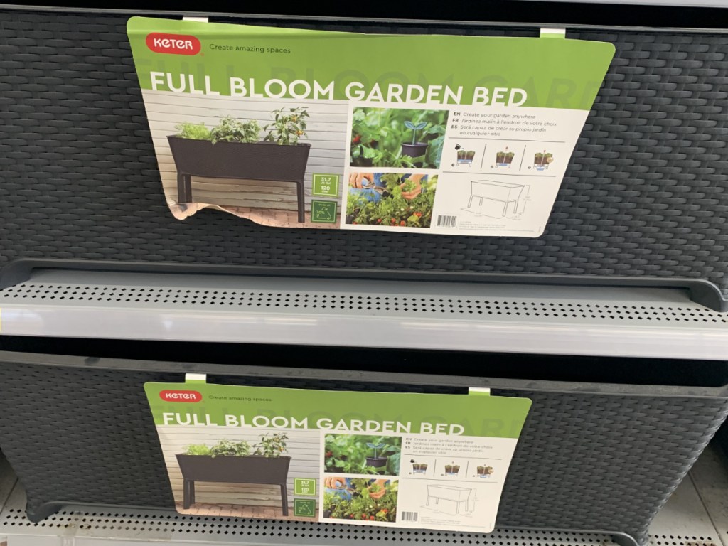 store shelf with resin garden beds on display