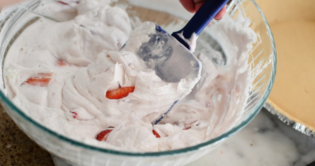 mixing bowl with whipped topping and yogurt