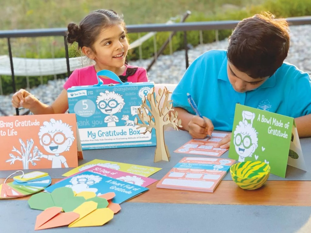 kids using contents of Gratitude Box