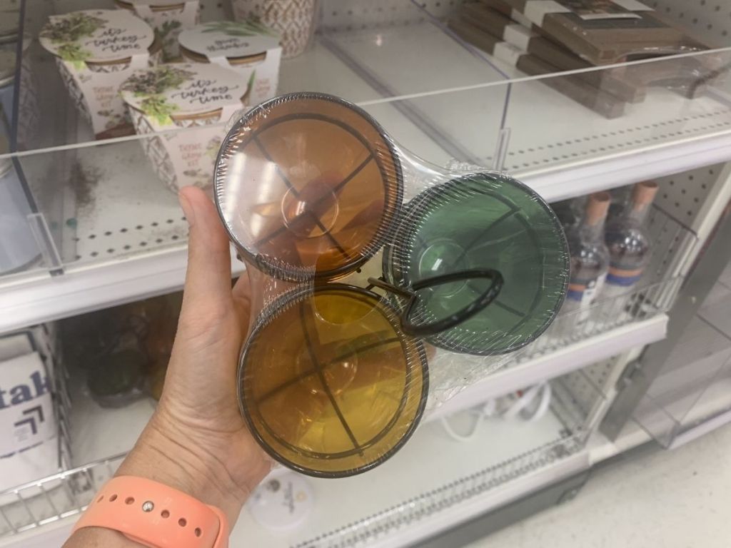 hand holding glass snack bowls