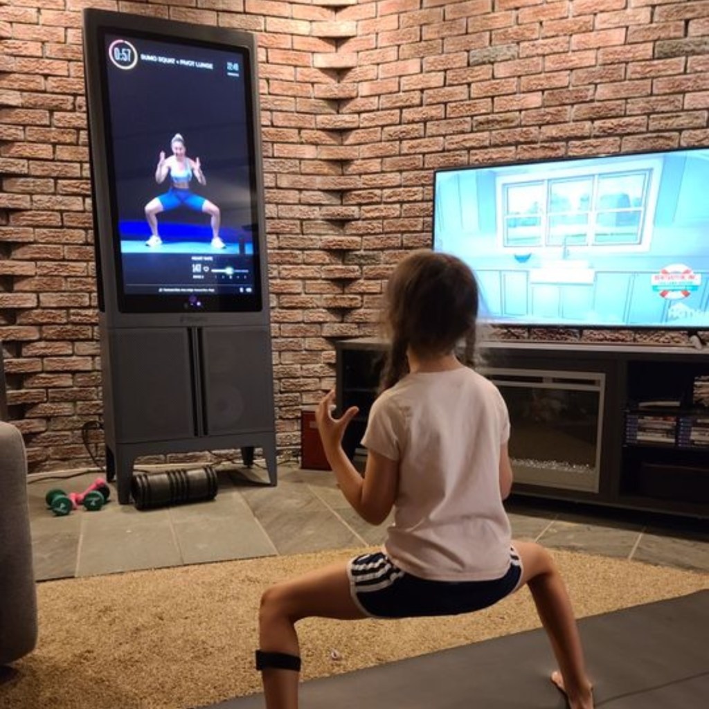 girl exercising in front of Tempo Studio