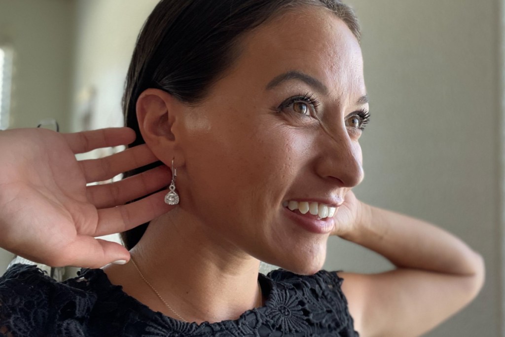 woman wearing cate & chloe earrings