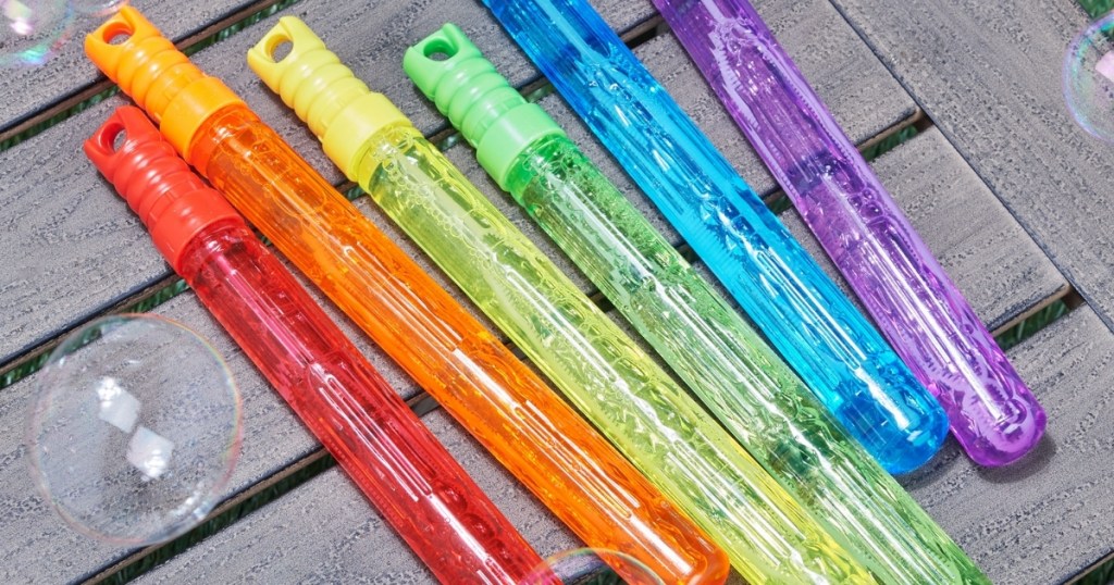 play day bubble sticks on table