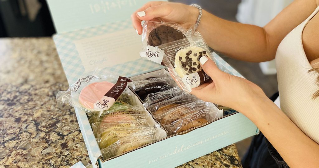 holding cookies from a mystery box