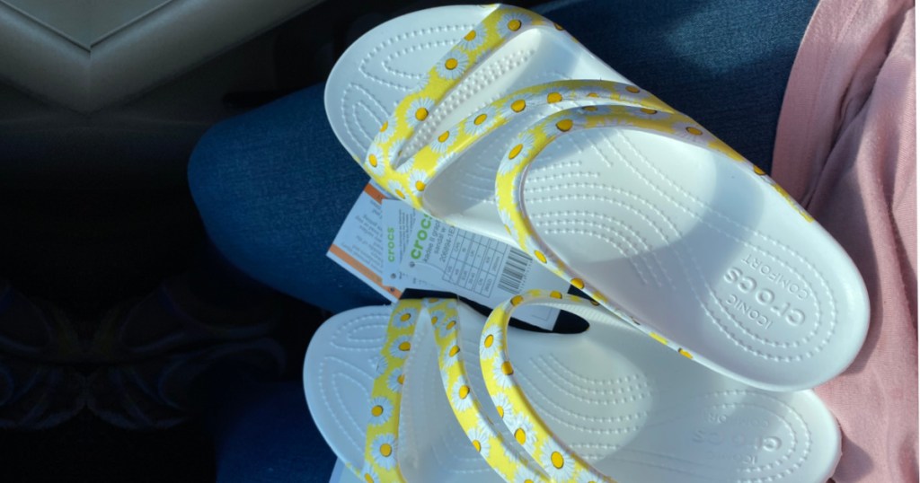 Crocs sandals with yellow daisies