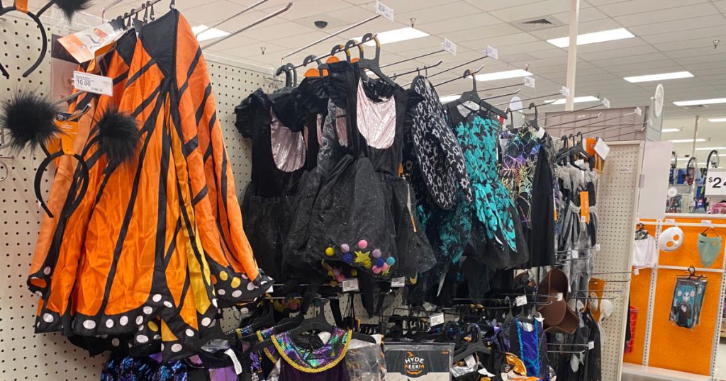 orange and black Halloween costume on racks 