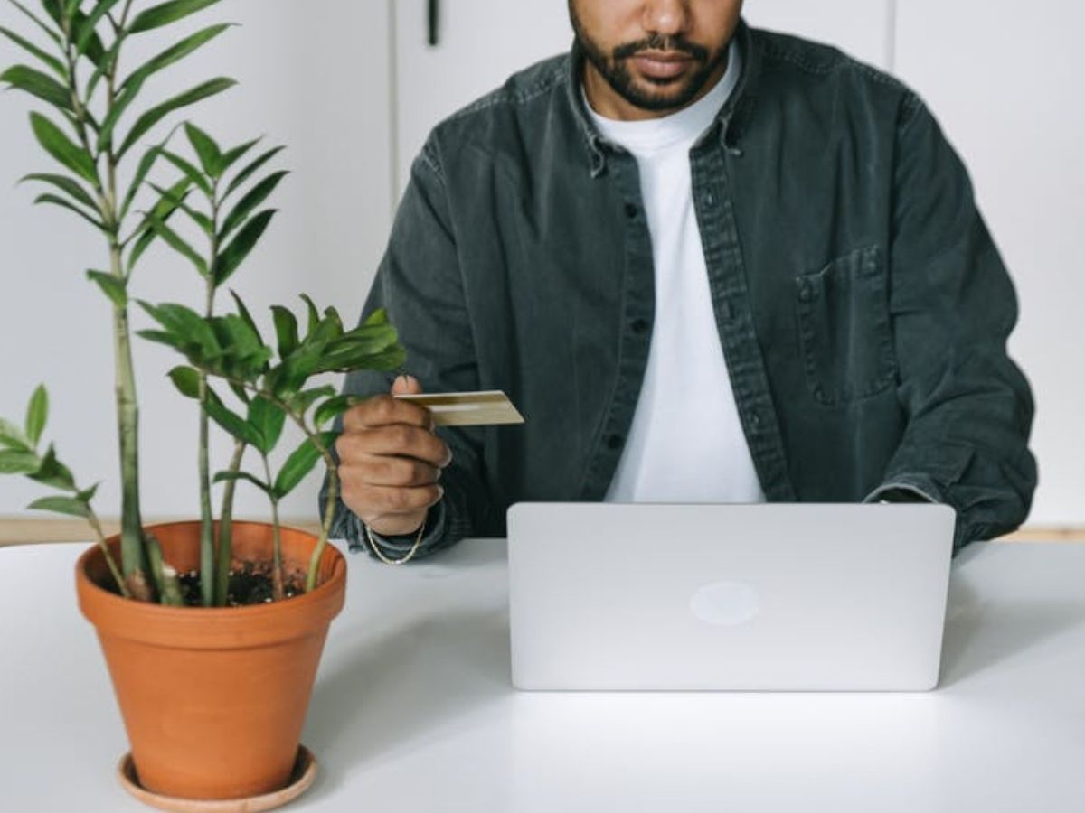 Man holding Credit Card