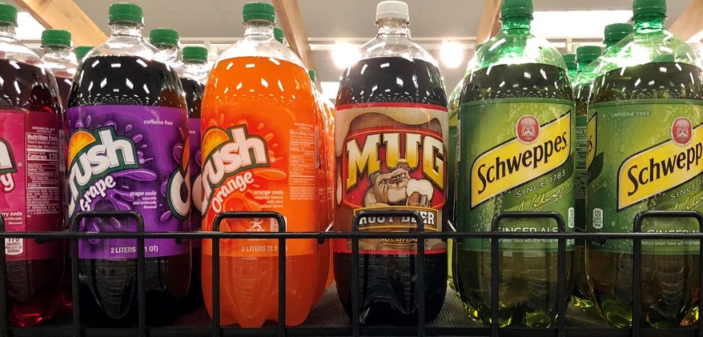 Mug Crush and Schweppes 2L bottles