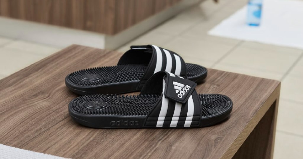 black and white sandles on table