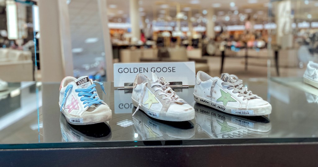 golden goose shoes on store display