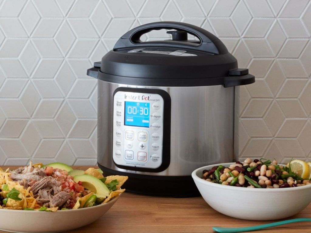 Instant pot with bowls of food