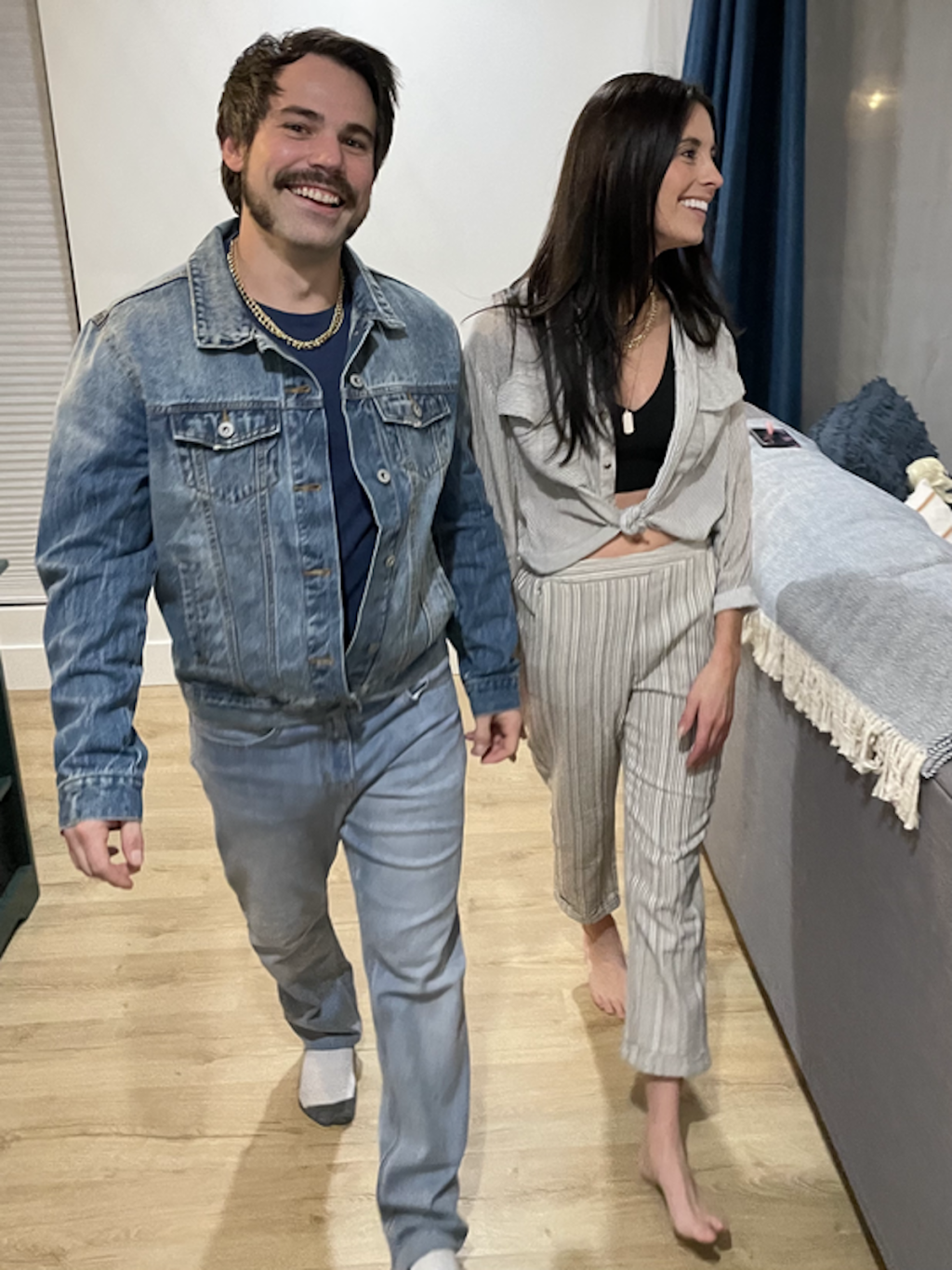 man and woman dressed as sonny and cher for easy diy halloween costume
