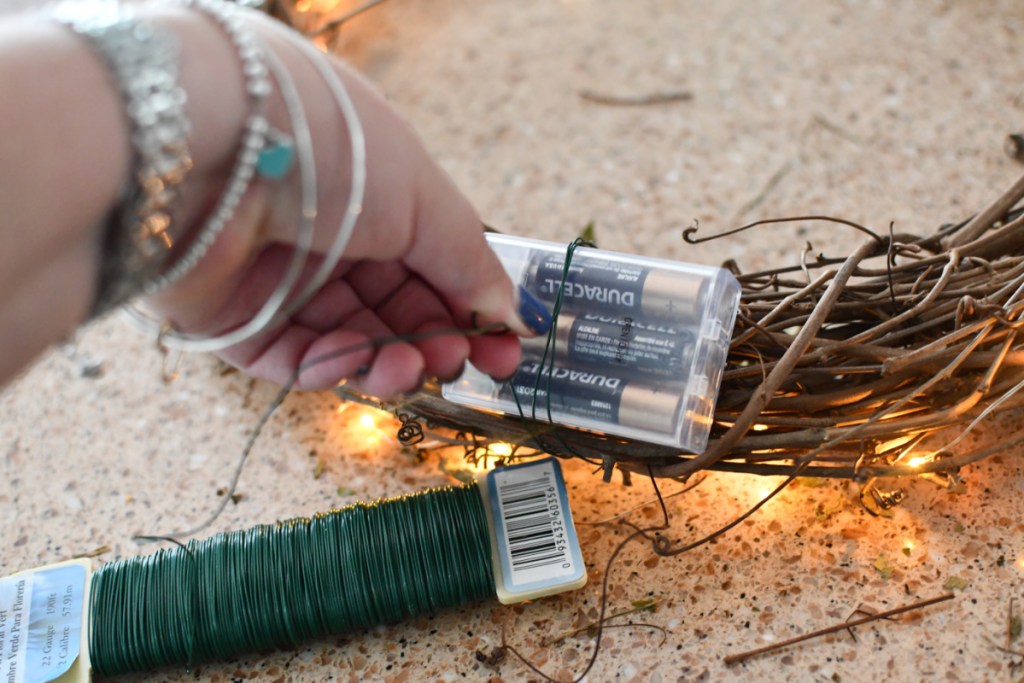 using floral wire to attach fairy lights