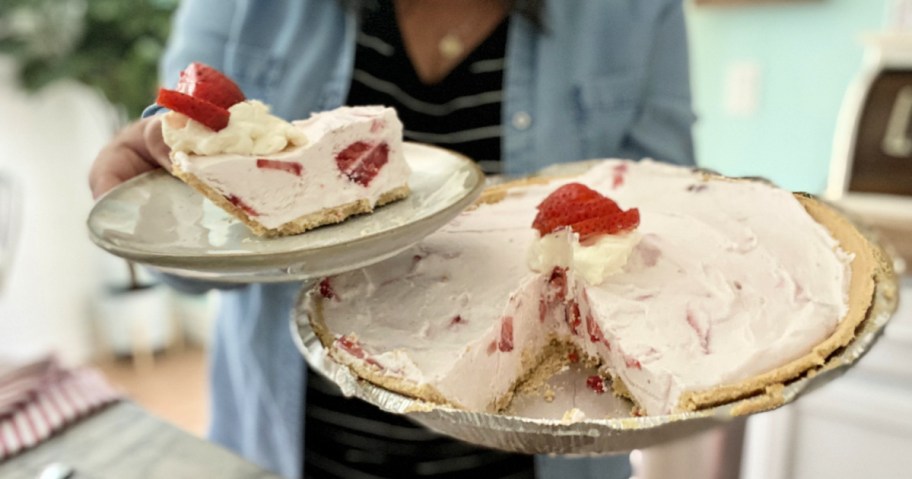 woman holding a frozen yogurt pie