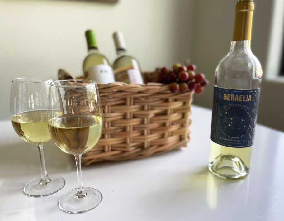 two glasses and bottle of wine on table