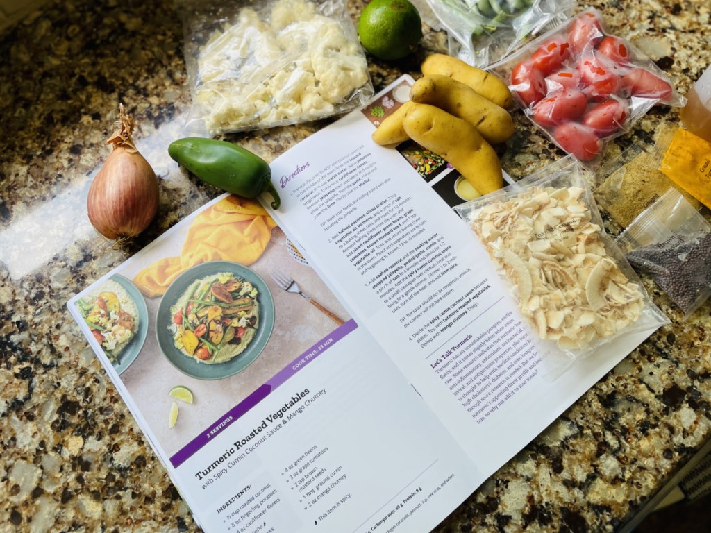 Purple Carrot Recipes and Ingredients on a kitchen counter