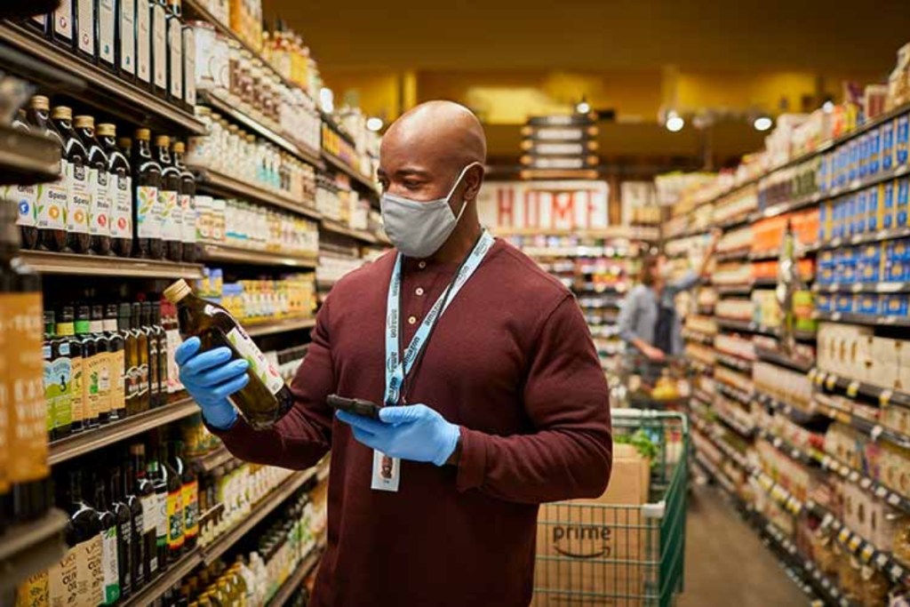 Amazon employee shopping at Whole Foods