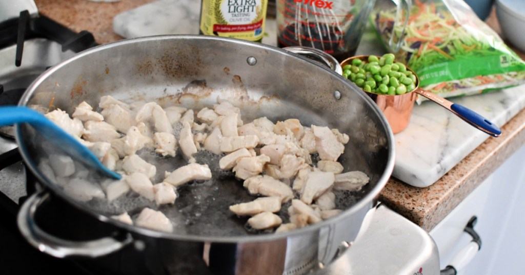 browning chicken in a pan