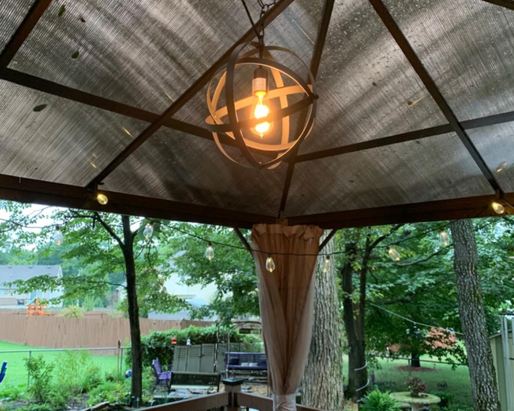 farmhouse light outside under gazebo