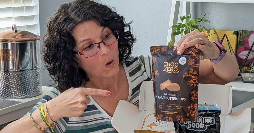 woman holding choczero peanut butter cups