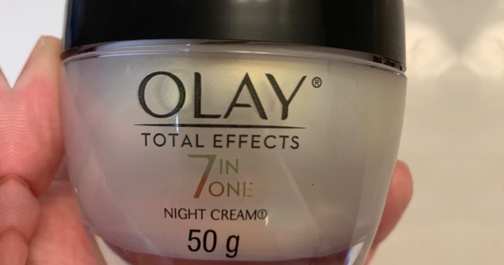 olay 7in 1 night cream in hand