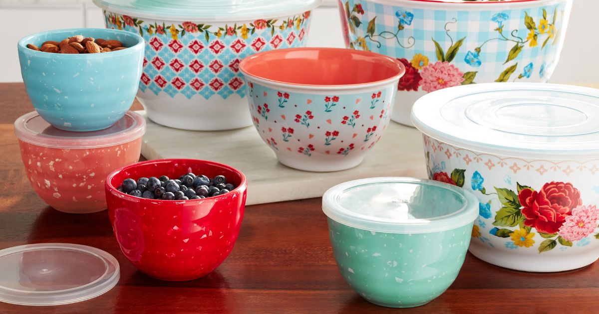 various pioneer woman prep and mixing bowls on counter, some with food in them, some with lids on