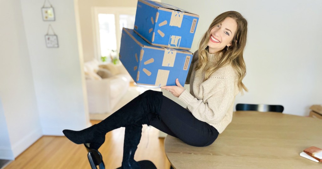 woman sitting on table holding what is ltk walmart winter fashion outfits