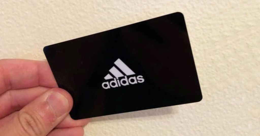 holding adidas gift card