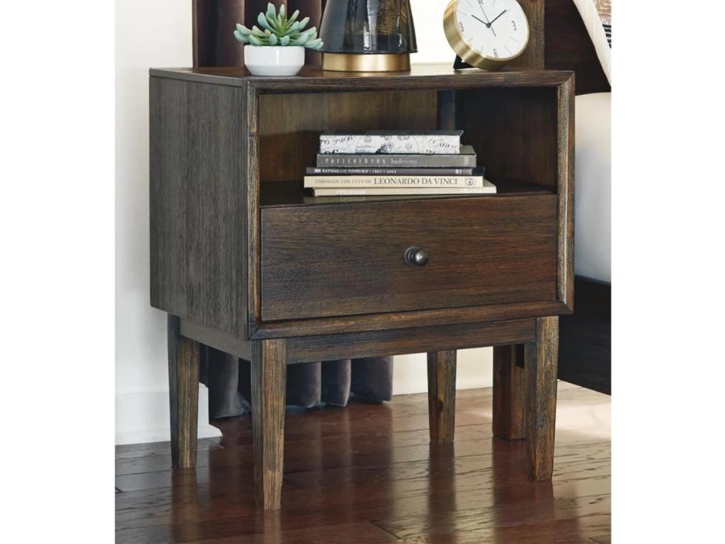 ashley homestore nightstand with books and clock