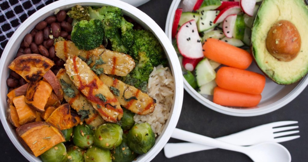 bowl showing food inside by white flatwear