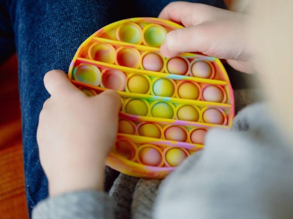 Chuckle & Roar Pop It! Fidget and Sensory Game in Tie Dye