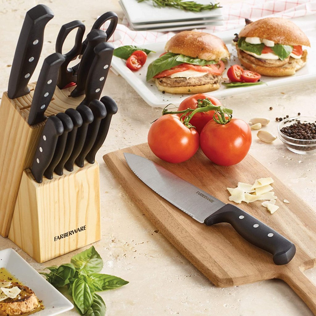 Farberware Never Needs Sharpening Set next to cutting board and vegetables