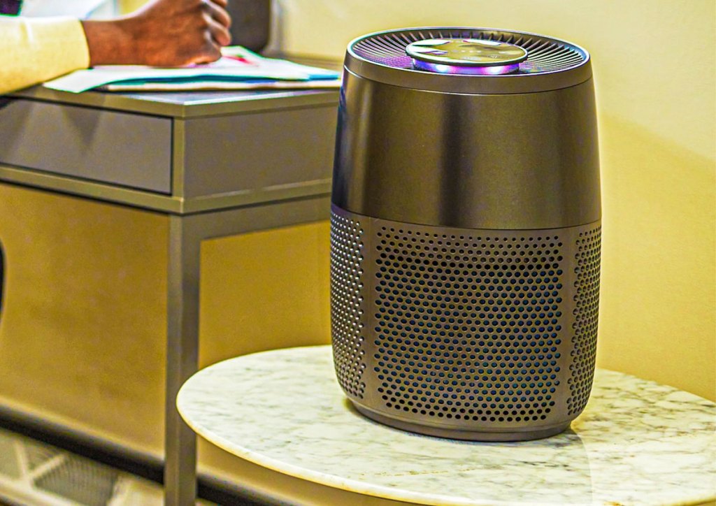 black air purifier on table