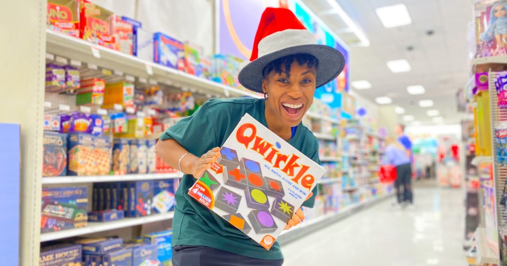 Woman Holding Qwirkle Game