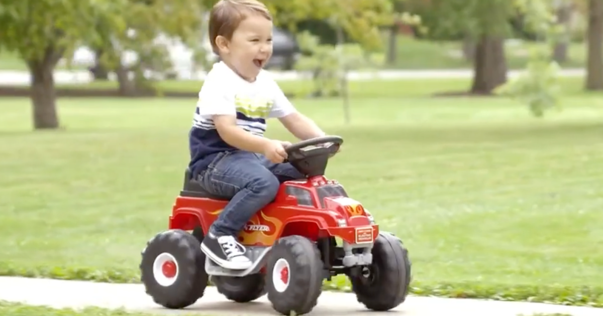 Boy driving Radio Flyer Ride-on Monster Truck